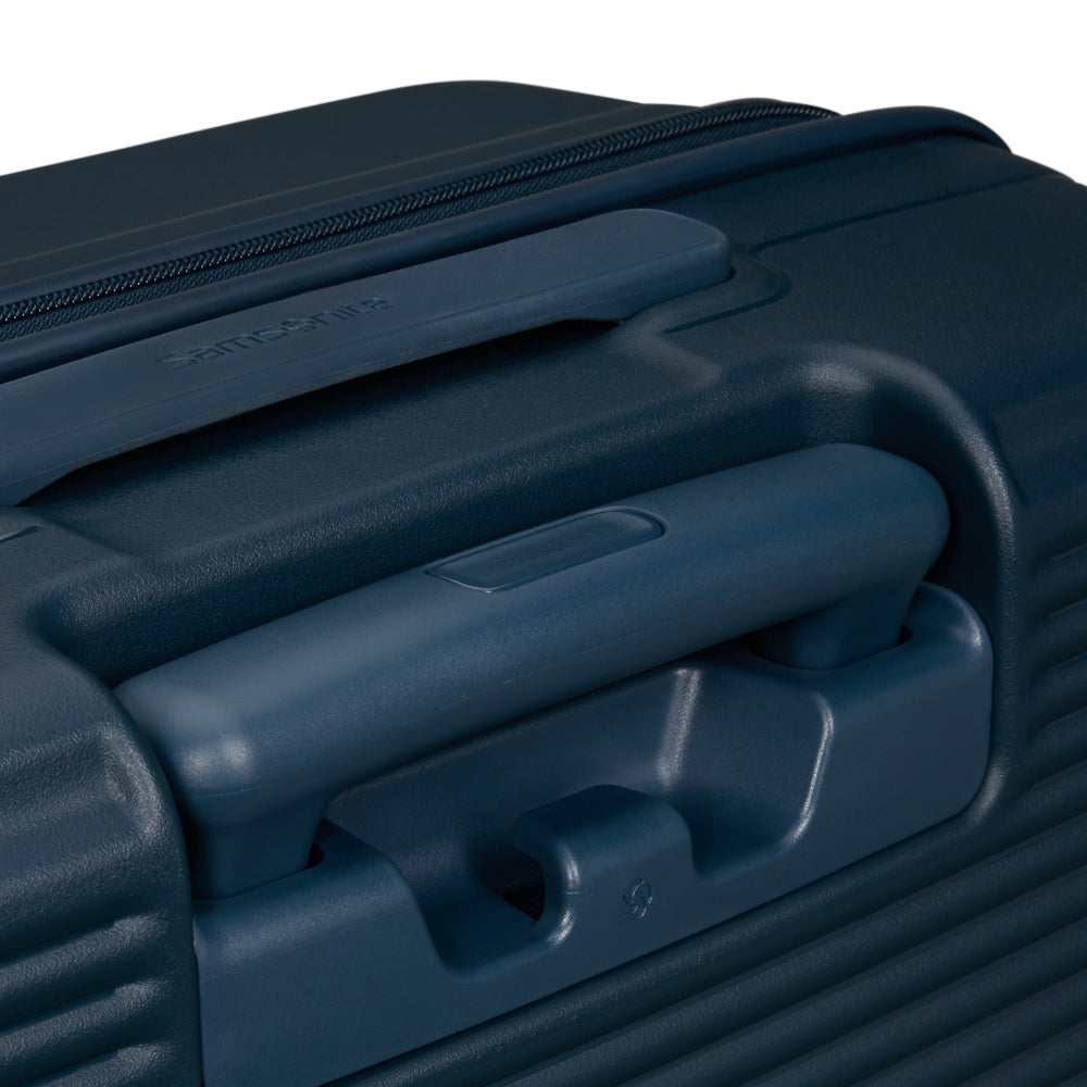 Navy Samsonite 55cm cabin suitcase with front pocket, showcasing durable design and spacious interior for travel convenience.