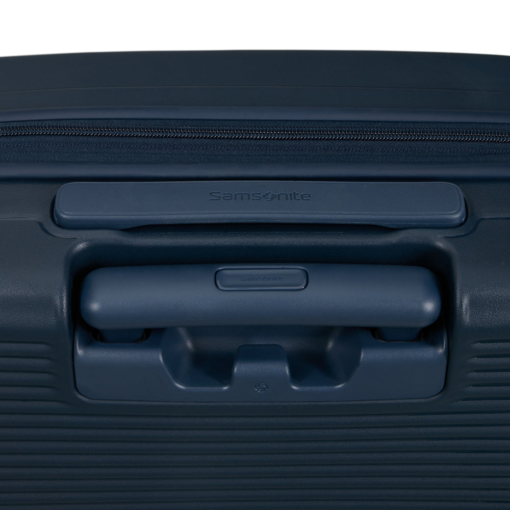 Navy 55cm Samsonite Cabin Suitcase with front pocket and sturdy handles, ideal for travel and convenient storage.