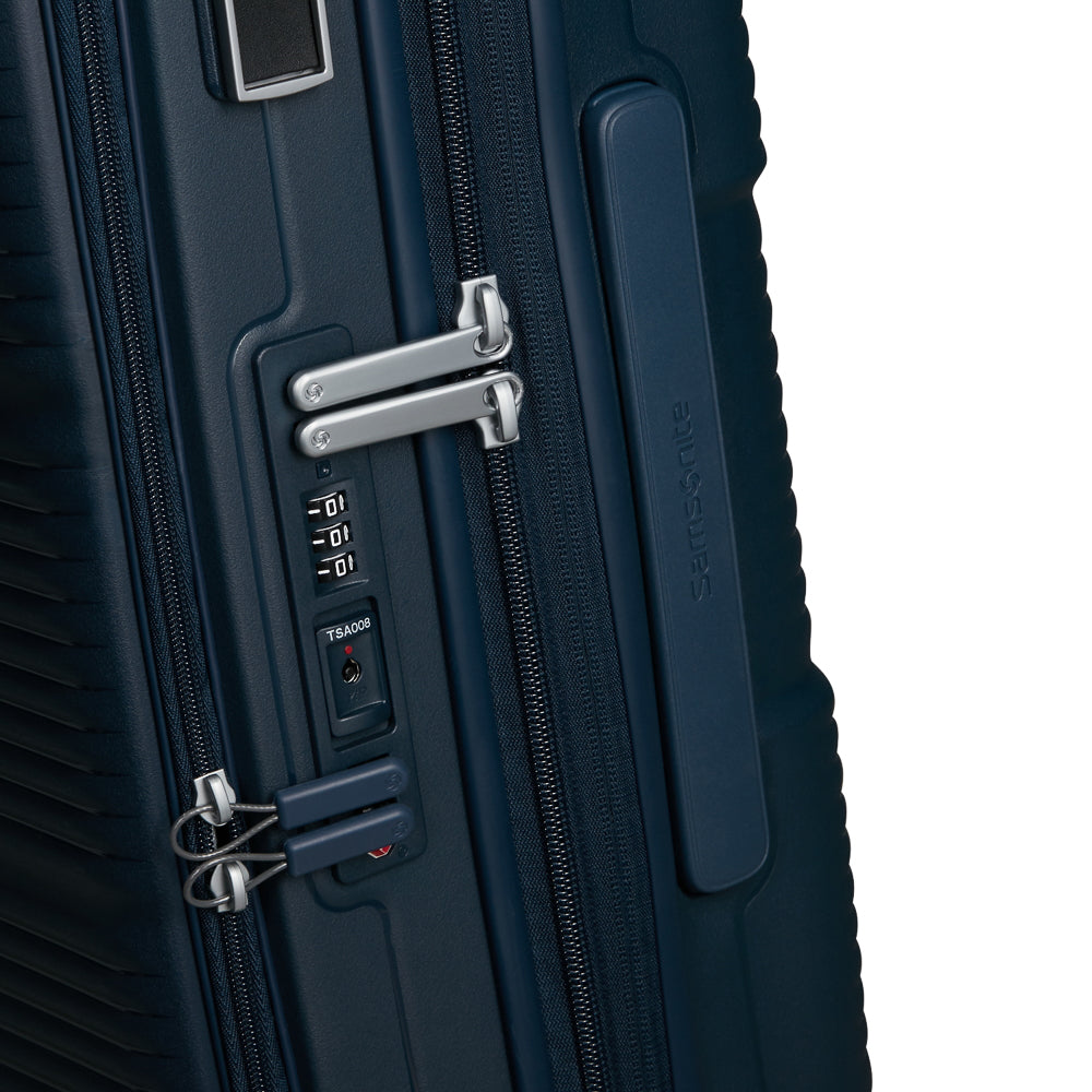Navy 55cm Samsonite Paralux cabin suitcase with front pocket and smooth wheels, ideal for travel.