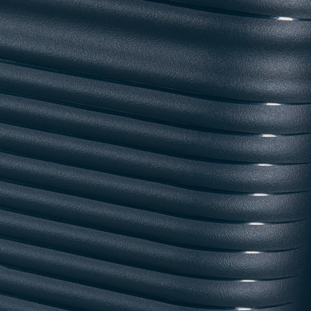 Navy 55cm Samsonite Paralux cabin suitcase with front pocket, featuring smooth wheels and a sturdy handle.