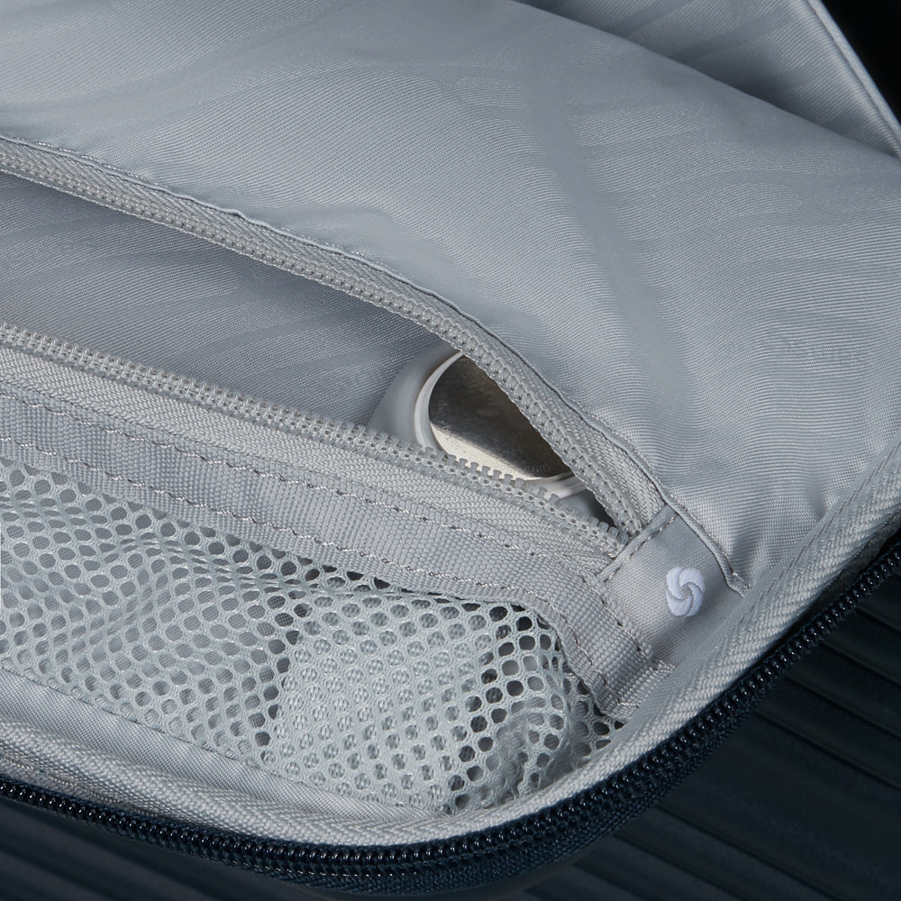 Navy 55cm Samsonite cabin suitcase with front pocket and smooth wheels, ideal for travel and easy maneuverability.