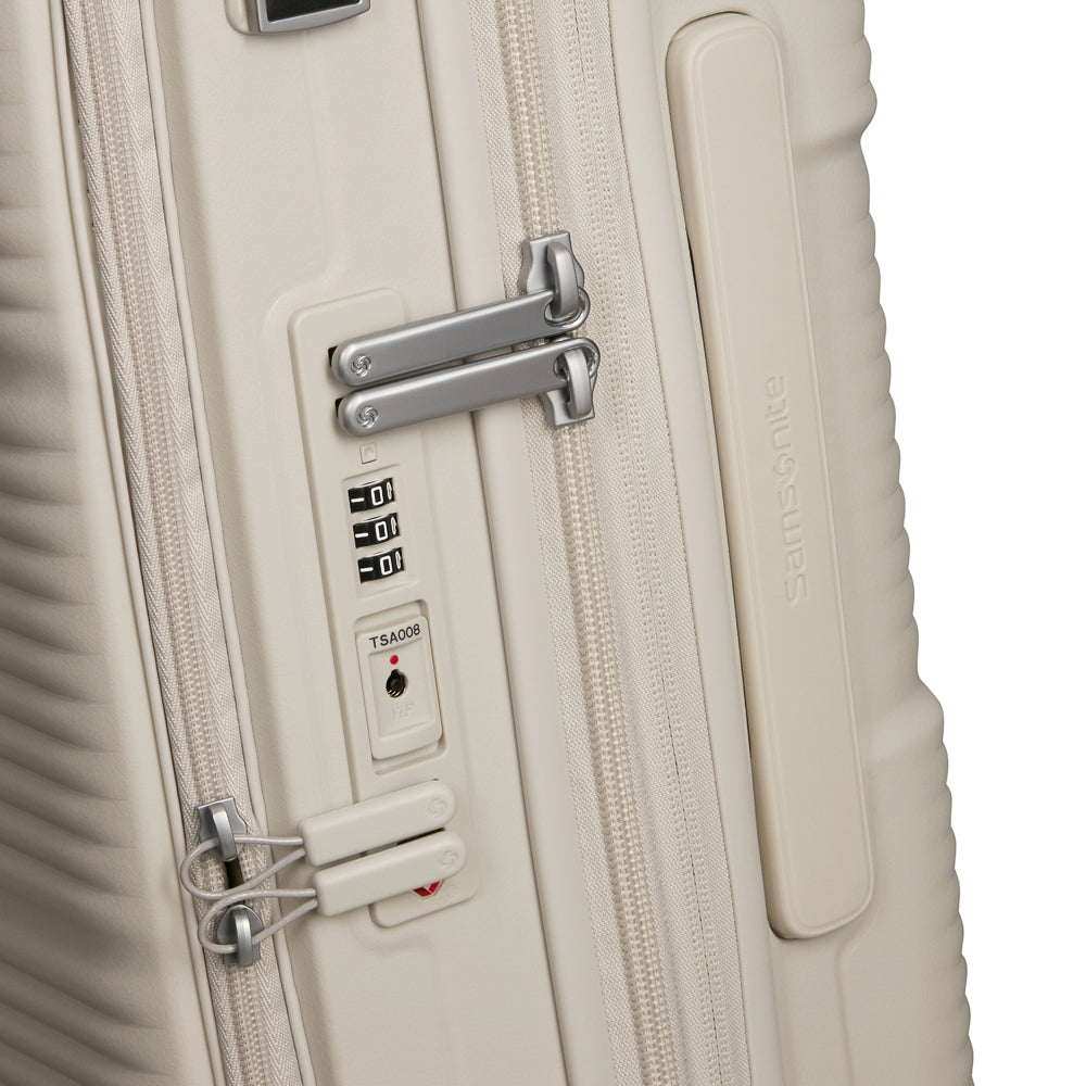 Samsonite 55cm white cabin suitcase with front pocket, showcasing sleek design and durable material for travel convenience.