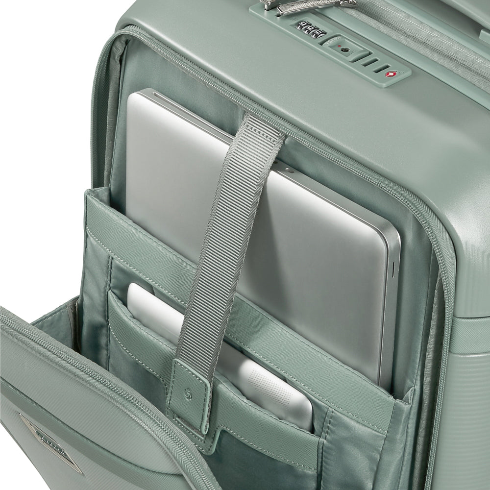 Samsonite 55cm carry-on suitcase in thyme green with front pocket, showcasing sleek design and durable wheels.