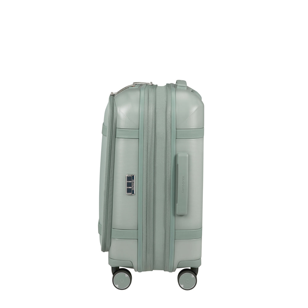 55cm Samsonite carry-on suitcase in thyme green with front pocket and wheels, ideal for cabin luggage travel.