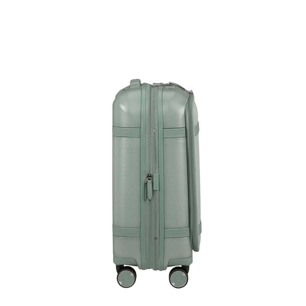 Samsonite 55cm carry-on suitcase with front pocket in thyme green, showcasing wheels and sturdy handle design.