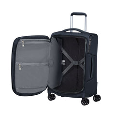 Midnight blue 55cm Samsonite Respark carry-on spinner suitcase with four wheels and a retractable handle.