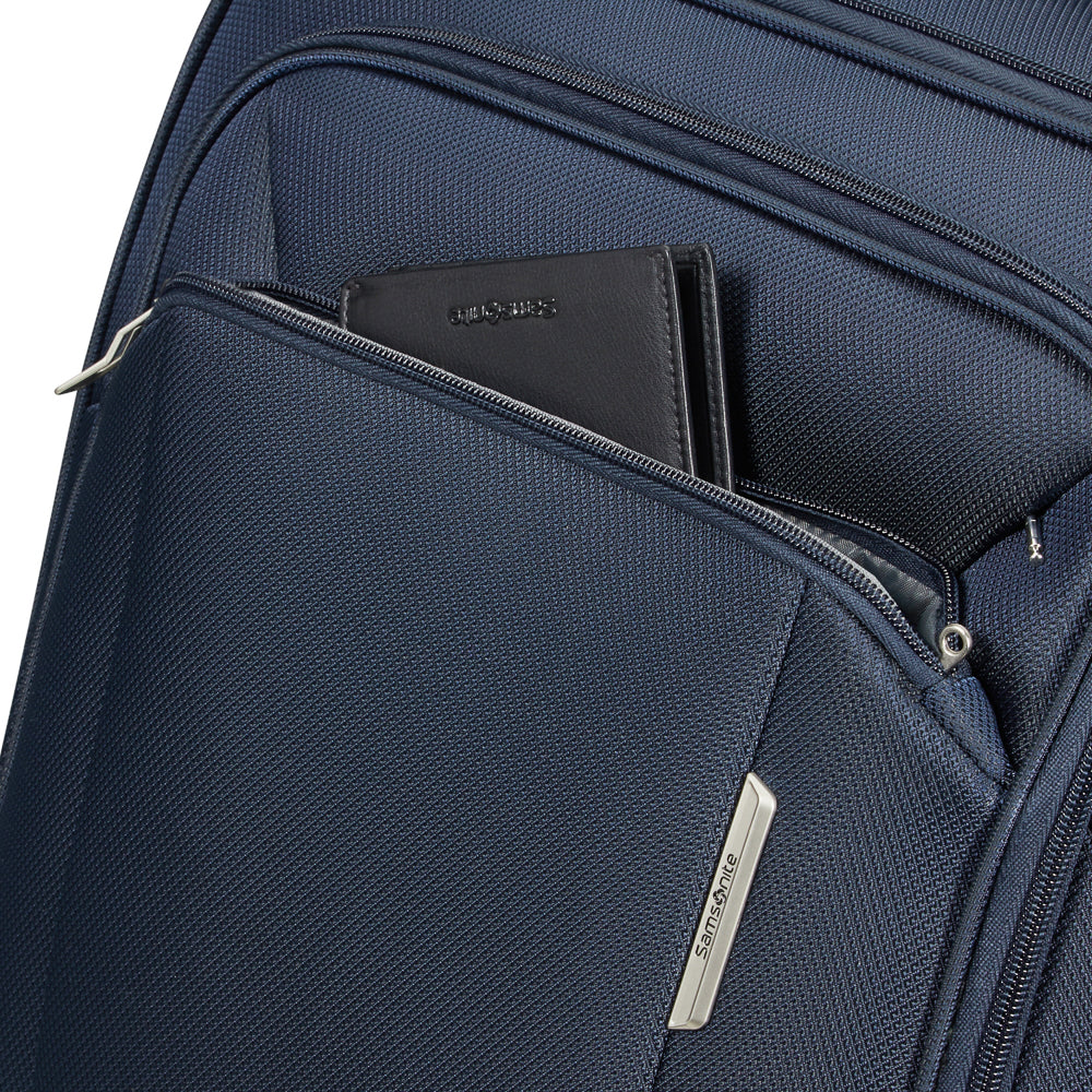 Midnight blue Samsonite 55cm Carry On Spinner Suitcase, featuring 360-degree wheels and a sleek design.