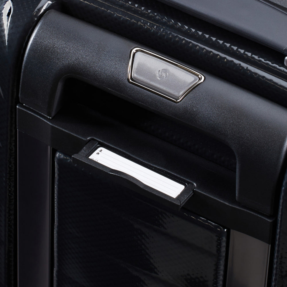 Black 55cm Proxis carry-on suitcase by Samsonite, featuring easy access compartments and durable design.