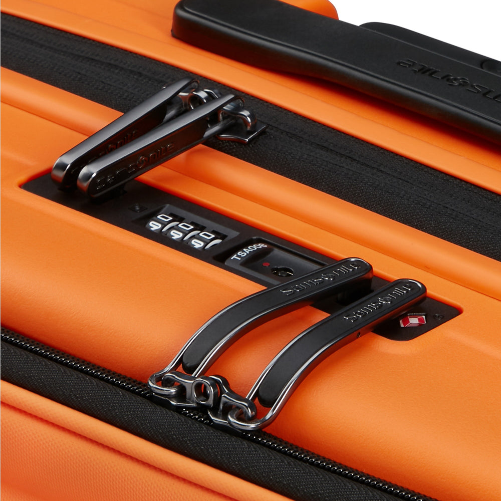 55cm Restackd cabin suitcase in papaya color by Samsonite, featuring a durable design and easy access compartments.