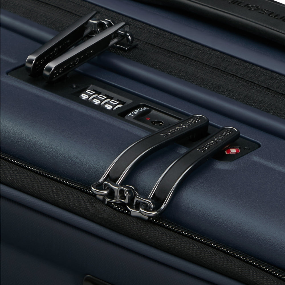 55cm Restackd cabin suitcase by Samsonite in midnight blue with easy access exterior and smooth wheels for travel.