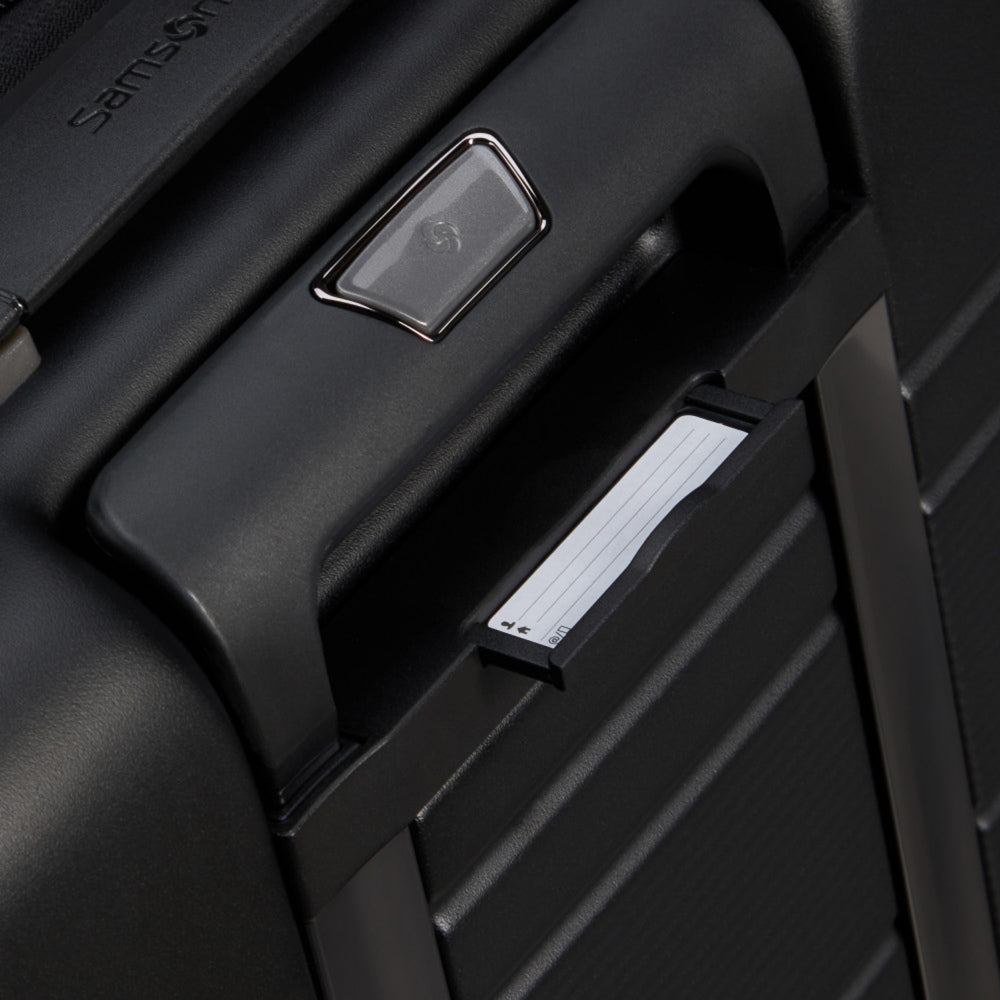 Samsonite Neopod 55cm expandable spinner suitcase in black with easy access compartments and smooth-rolling wheels.