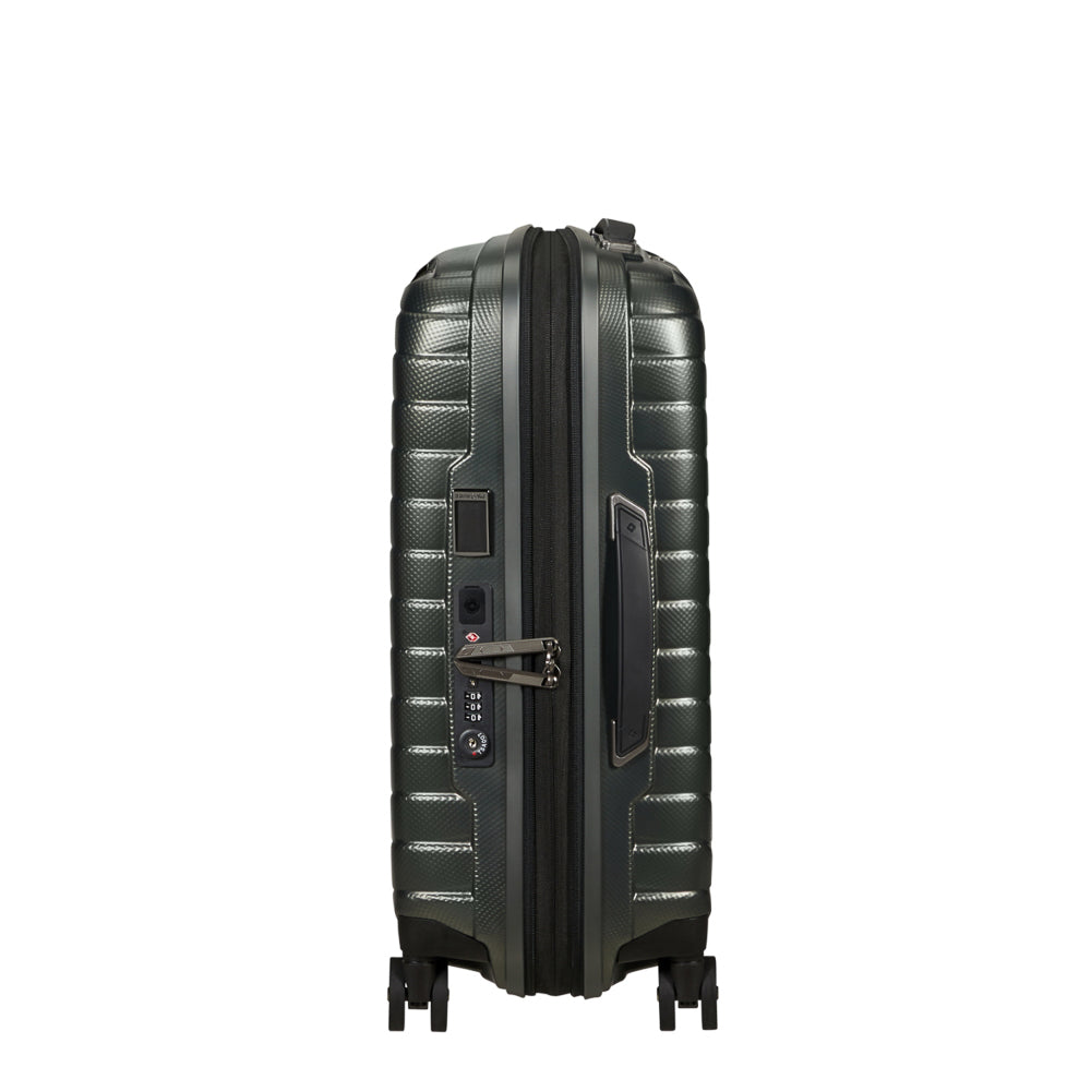 Samsonite Proxis 55cm expandable cabin spinner suitcase in climbing ivy color, showcasing wheels and handle details.