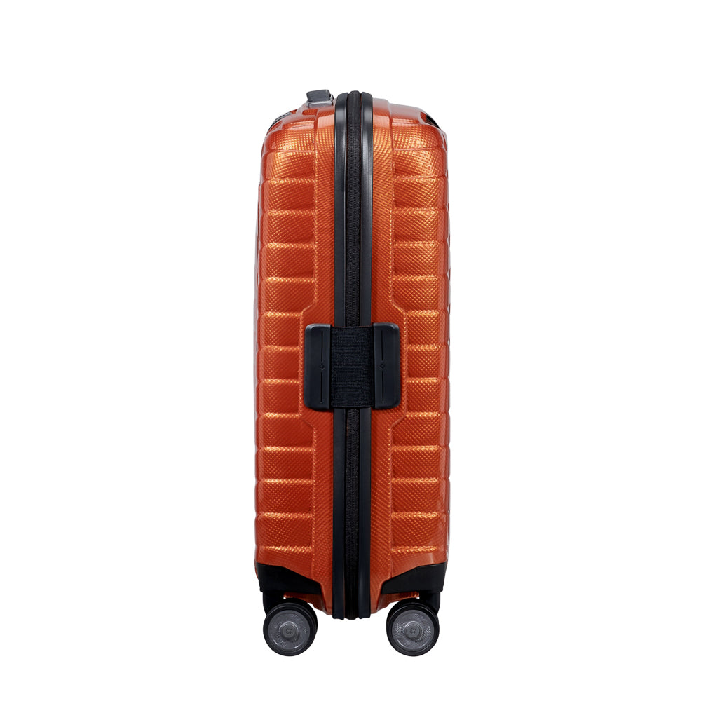 55cm Samsonite Proxis expandable cabin spinner suitcase in vibrant flame color, showcasing smooth wheels and sturdy handle.