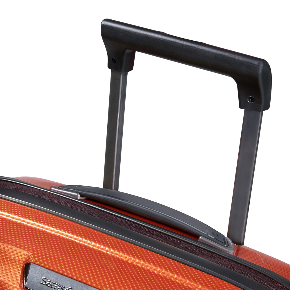 55cm Samsonite Proxis expandable cabin spinner suitcase in vibrant flame color, showcasing smooth wheels and durable exterior.