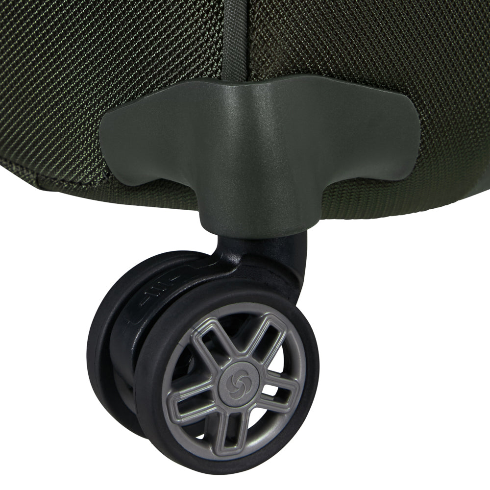 Samsonite Re-Lite 55cm expandable carry-on suitcase in green with sturdy handle and wheels for easy travel.