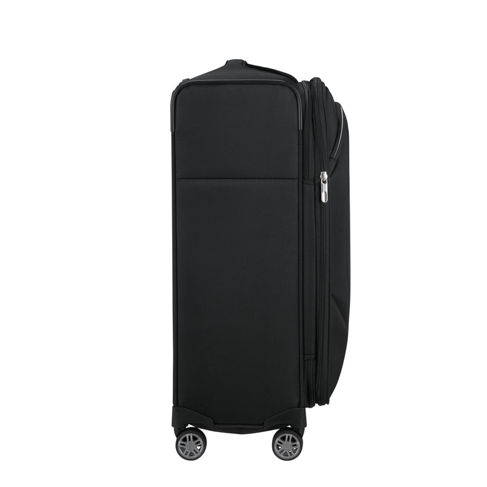 Black 67cm expandable spinner suitcase by Samsonite, featuring smooth wheels and durable exterior for travel convenience.