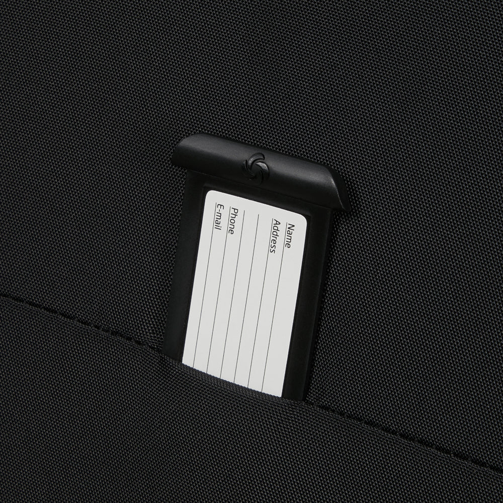 Samsonite Re-Lite 67cm expandable spinner suitcase in black, showcasing its durable design and spacious interior.