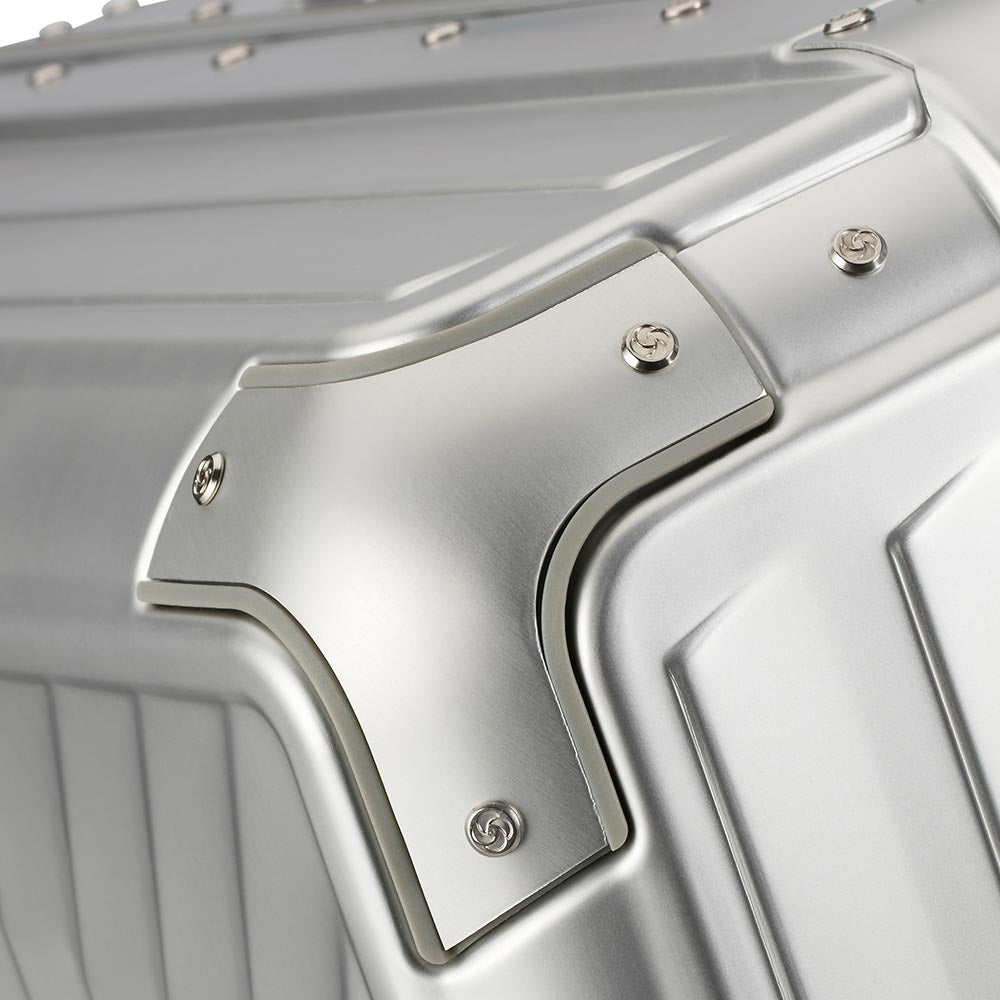 Samsonite Lite-Box Aluminium 69cm spinner suitcase with sleek design and four wheels for easy maneuverability.