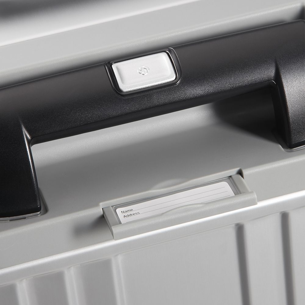 Samsonite Litebox Aluminium 74cm check-in suitcase with sleek design and sturdy handles, showcasing aluminum finish.