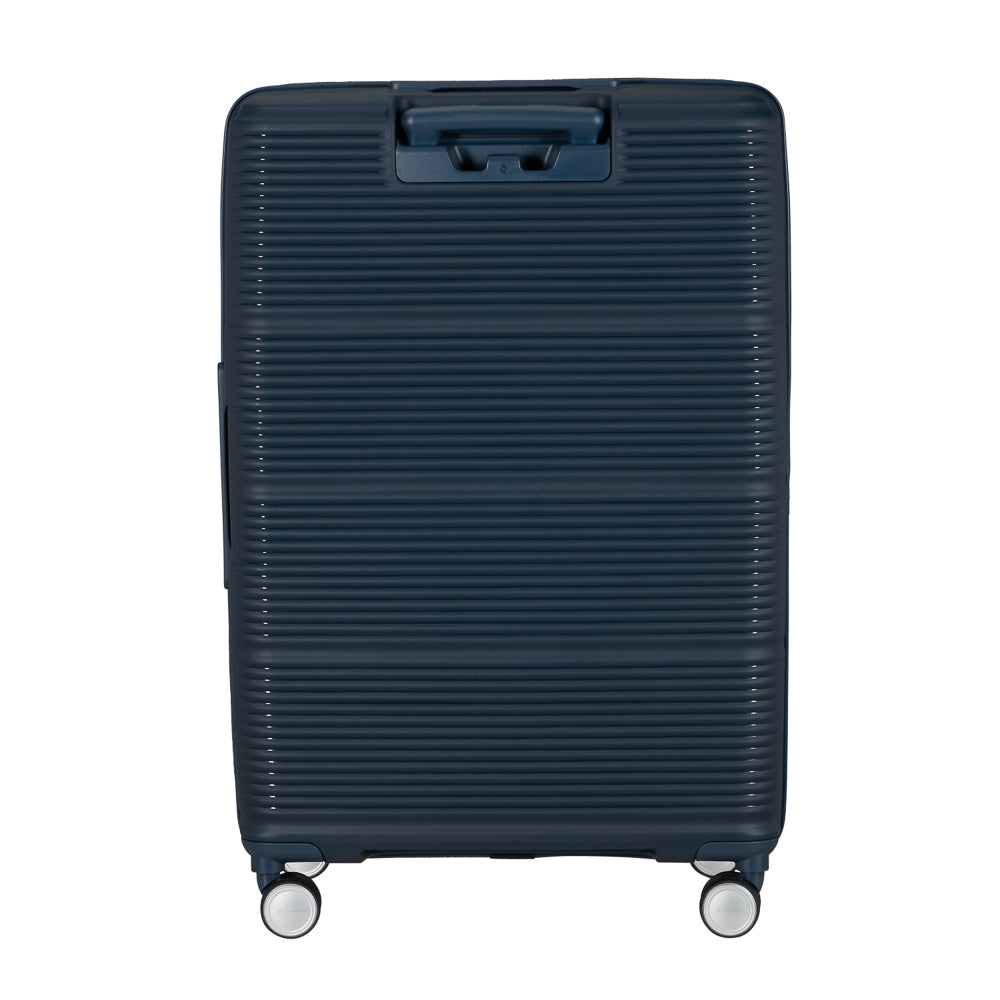 Navy 75cm expandable spinner suitcase by Samsonite, featuring four wheels and a sturdy handle for easy travel.