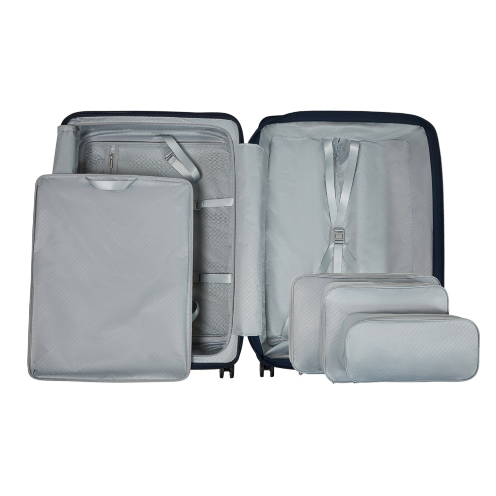 Navy 75cm expandable spinner suitcase by Samsonite, featuring four wheels and a sturdy handle for easy travel.