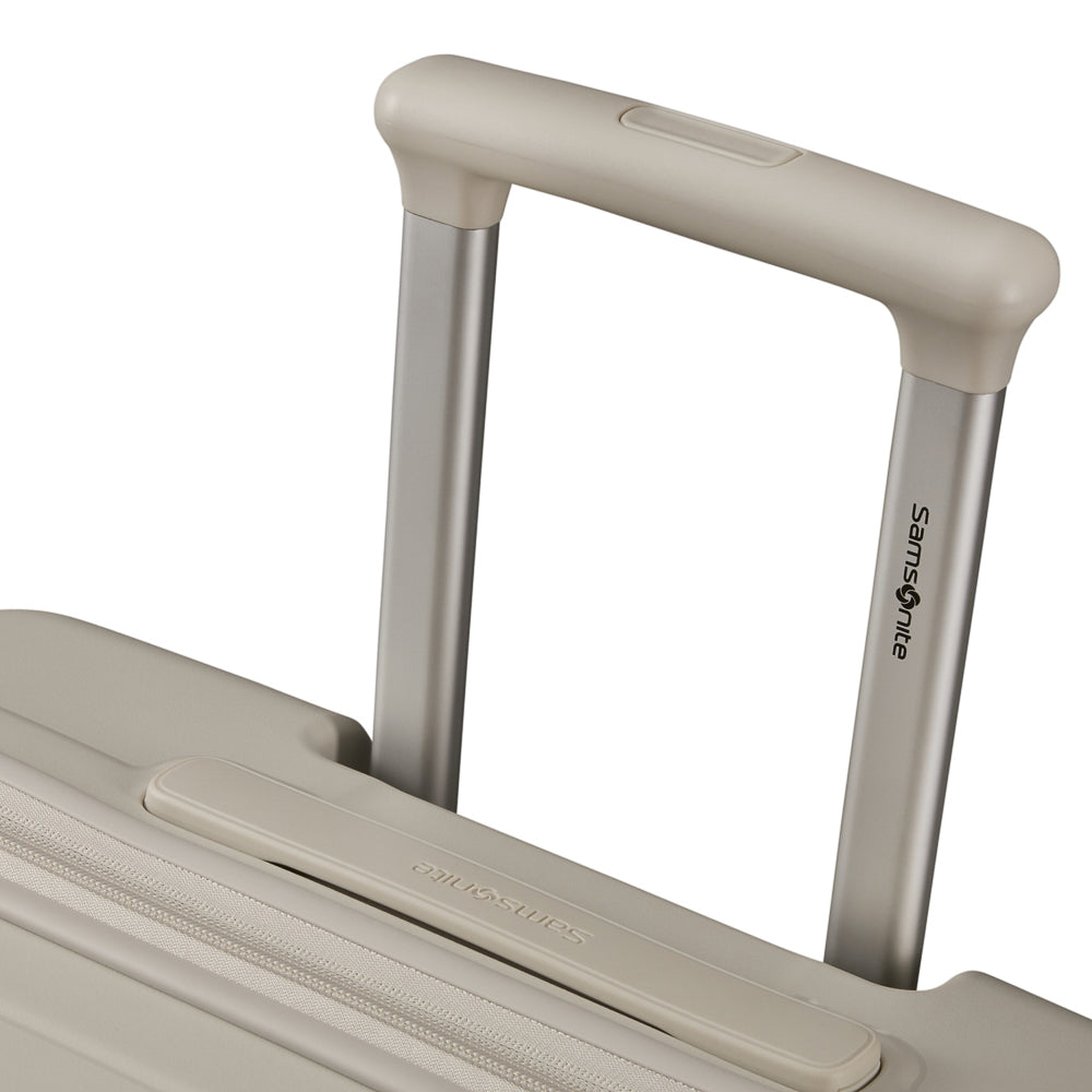 White 75cm expandable spinner suitcase by Samsonite, featuring four wheels and a sleek design for check-in luggage.