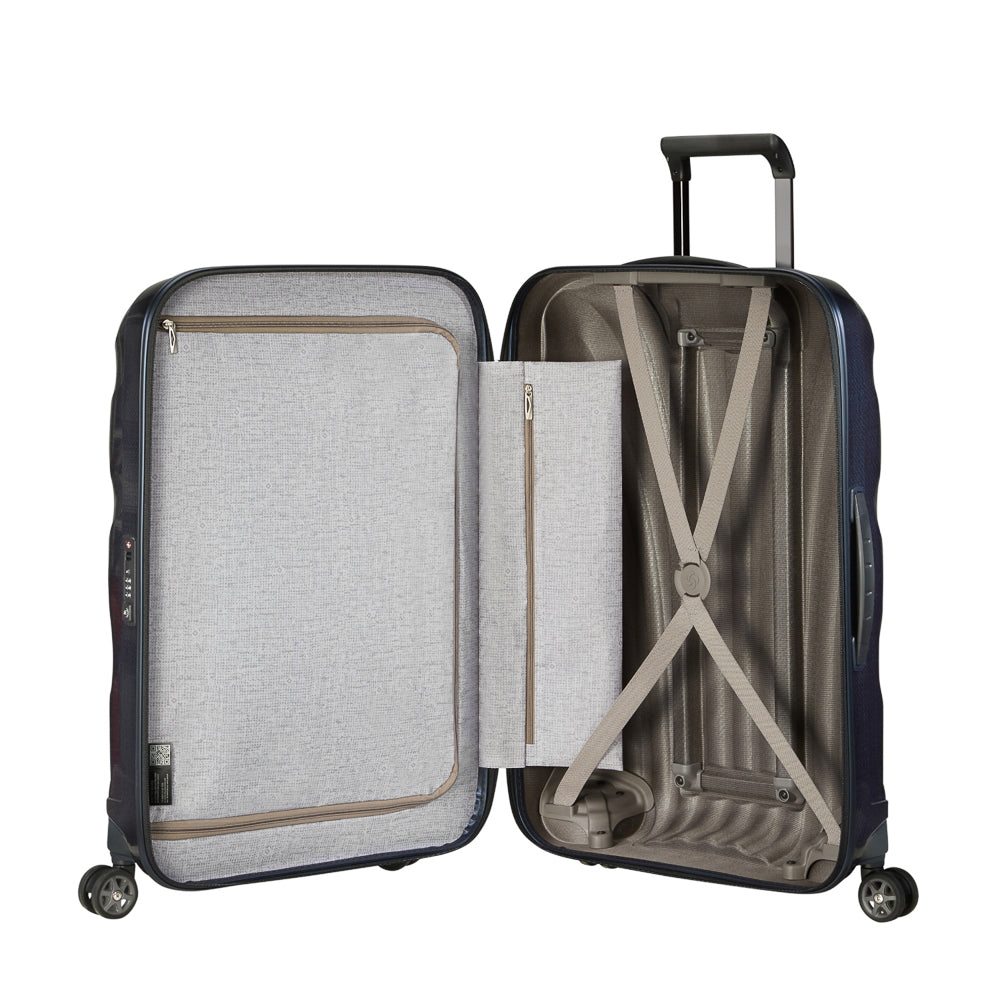 Midnight blue 75cm Samsonite C-Lite spinner suitcase with four wheels and a telescopic handle.
