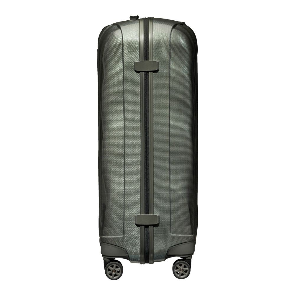 Metallic green Samsonite C-Lite 75cm spinner suitcase with four wheels and a sleek design for check-in luggage.