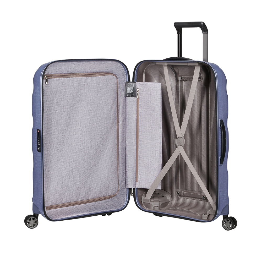 Lavender Samsonite C-Lite 75cm spinner suitcase with four wheels and a sleek design for easy travel.