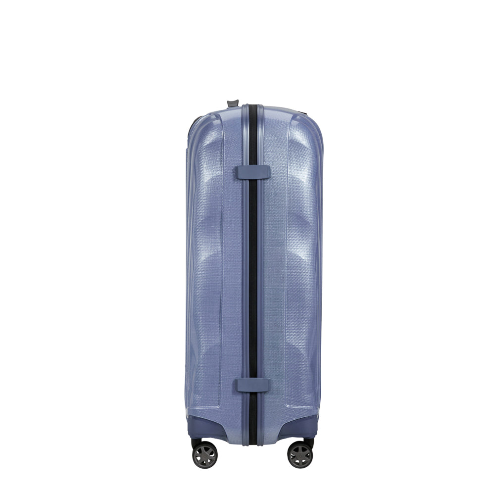 Lavender 75cm Samsonite C-Lite spinner suitcase with a sleek design and four wheels for easy mobility.