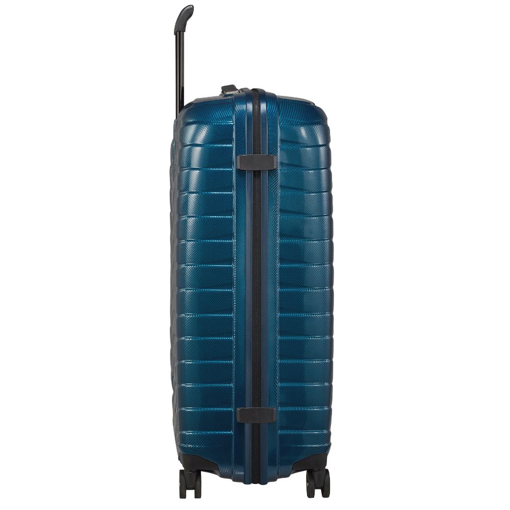75cm petrol blue Samsonite Proxis spinner suitcase with four wheels and a sturdy handle for easy travel.