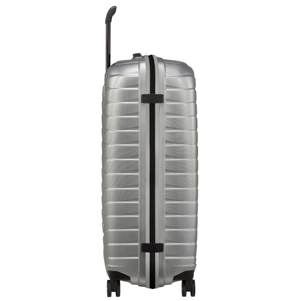 Silver 75cm Samsonite Proxis Spinner Suitcase with wheels and sturdy handle, perfect for check-in luggage.