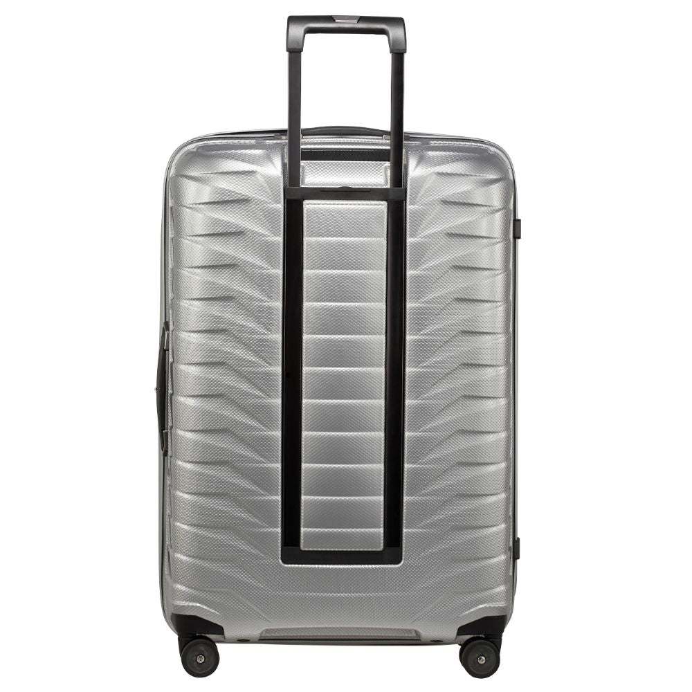 Silver 75cm Proxis spinner suitcase by Samsonite, showcasing its sleek design and four wheels for easy maneuverability.