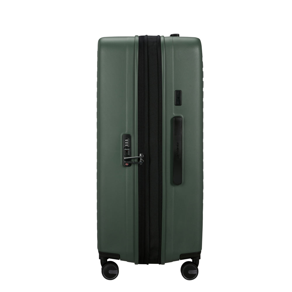 75cm Spinner Suitcase by Samsonite in sage green, featuring four wheels and a spacious interior for travel convenience.