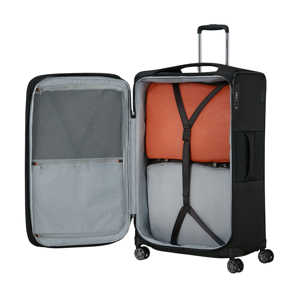 Black 78cm Samsonite Re-Lite expandable spinner suitcase with four wheels for easy mobility.