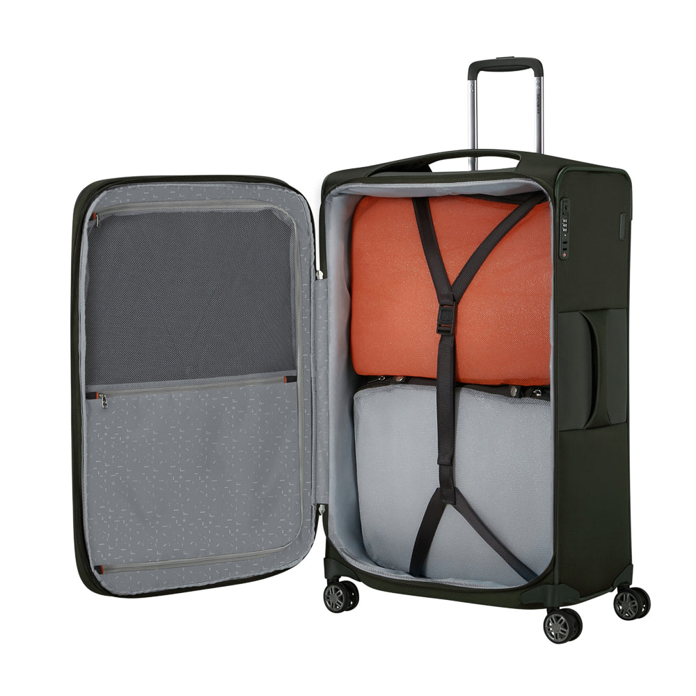 Green 78cm expandable spinner suitcase by Samsonite, featuring smooth wheels and spacious compartments for travel.