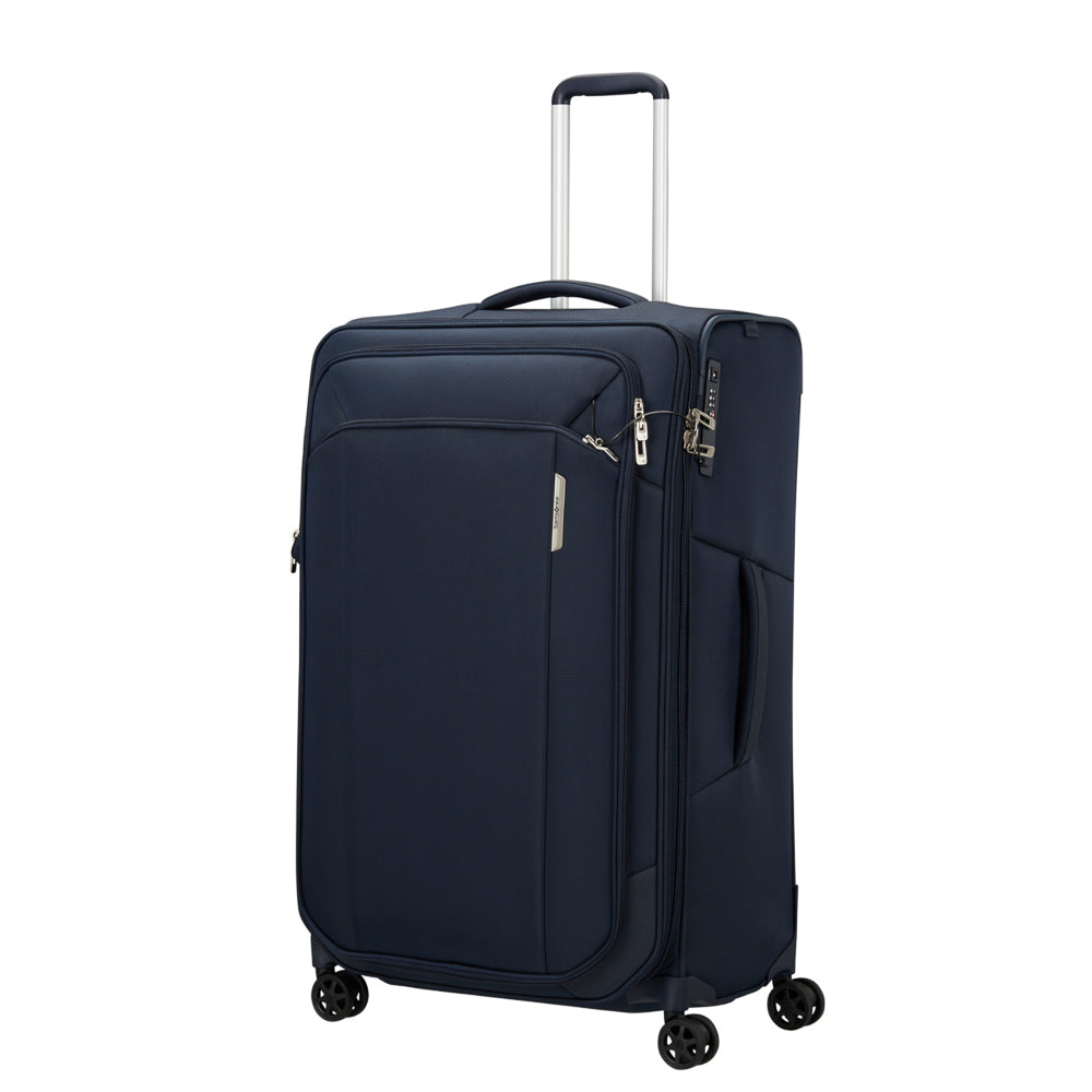 Midnight blue Samsonite Respark 79cm spinner suitcase with four wheels and a durable design for check-in luggage.