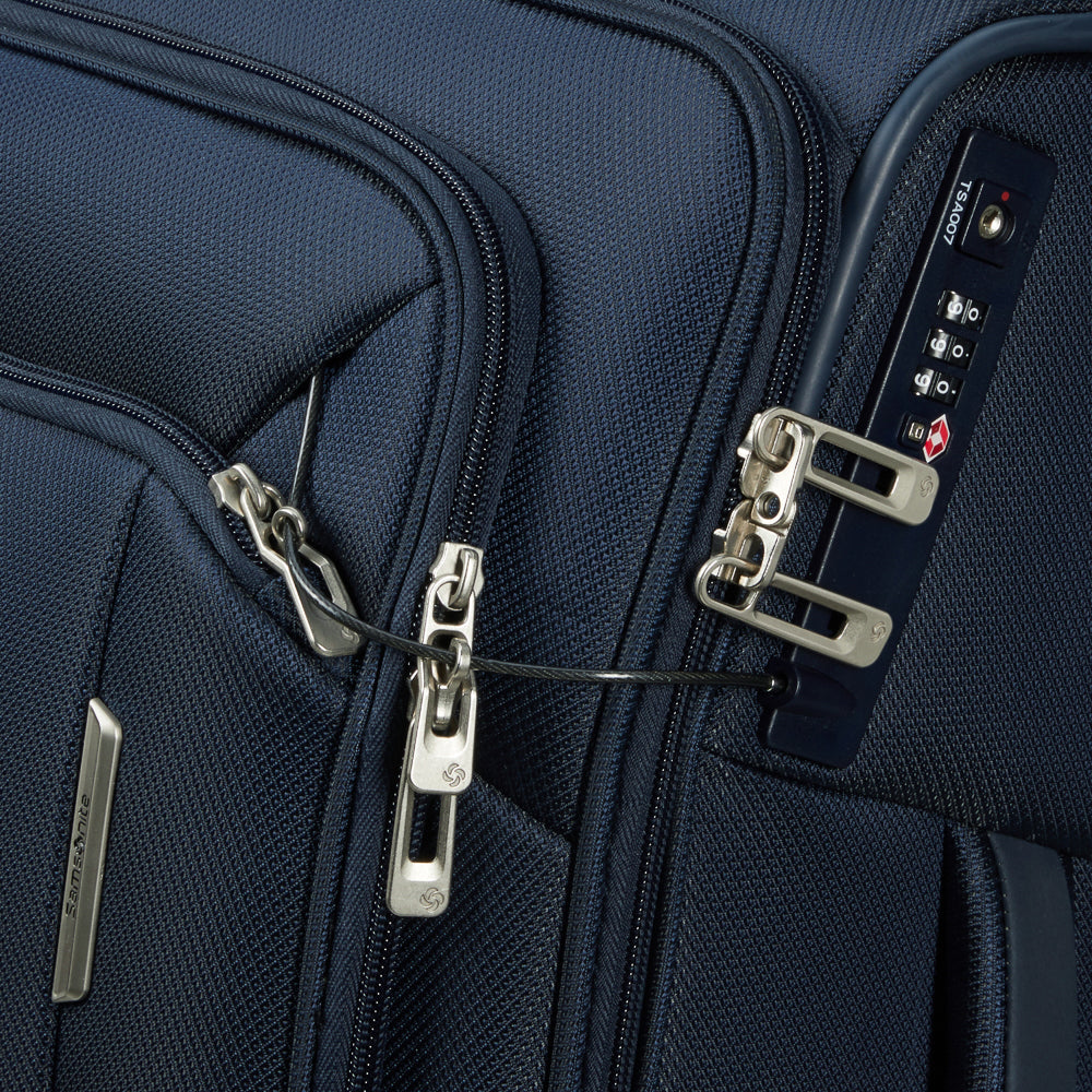 79cm Samsonite Respark spinner suitcase in midnight blue, featuring four wheels and a spacious interior for travel.