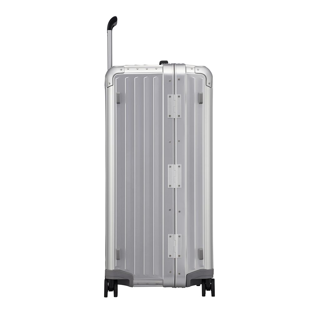 Samsonite Litebox Aluminium 80cm trunk suitcase in silver, featuring a sleek design and sturdy handle for check-in travel.