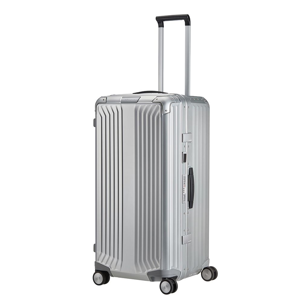 Samsonite Litebox 80cm aluminium check-in suitcase with a sleek design and sturdy handle, showcased in a travel setting.