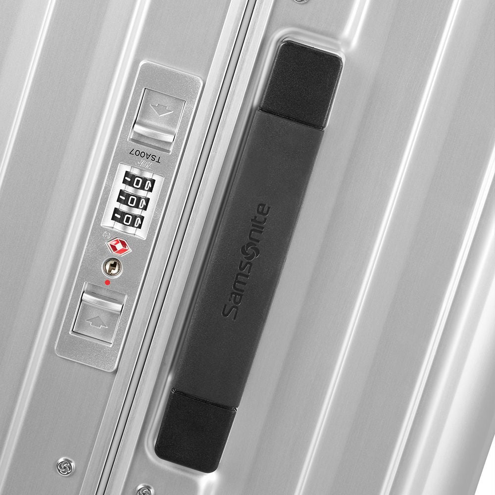 Samsonite Litebox 80cm trunk suitcase in aluminum, featuring a sleek design and durable exterior for check-in luggage.