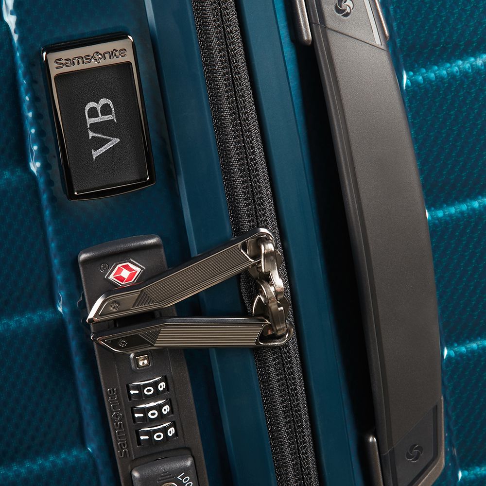 Petrol blue Samsonite Proxis 81cm spinner suitcase with four wheels and a sleek design, ideal for check-in luggage.