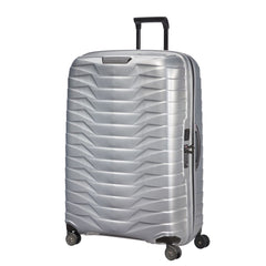 Silver Samsonite Proxis 81cm spinner suitcase with smooth wheels and durable exterior, perfect for check-in luggage.
