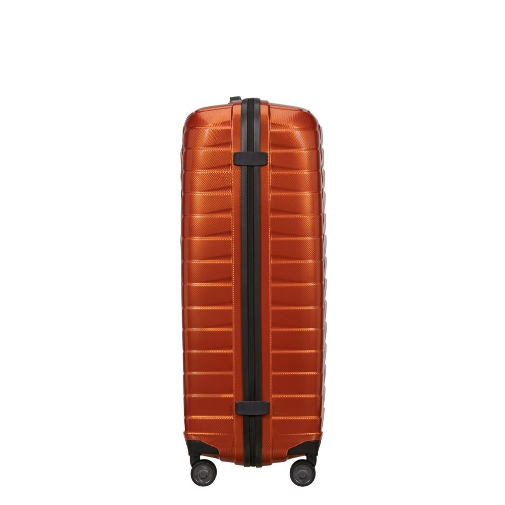 81cm Proxis spinner suitcase in flame color, showcasing durable design and smooth-rolling wheels for check-in luggage.
