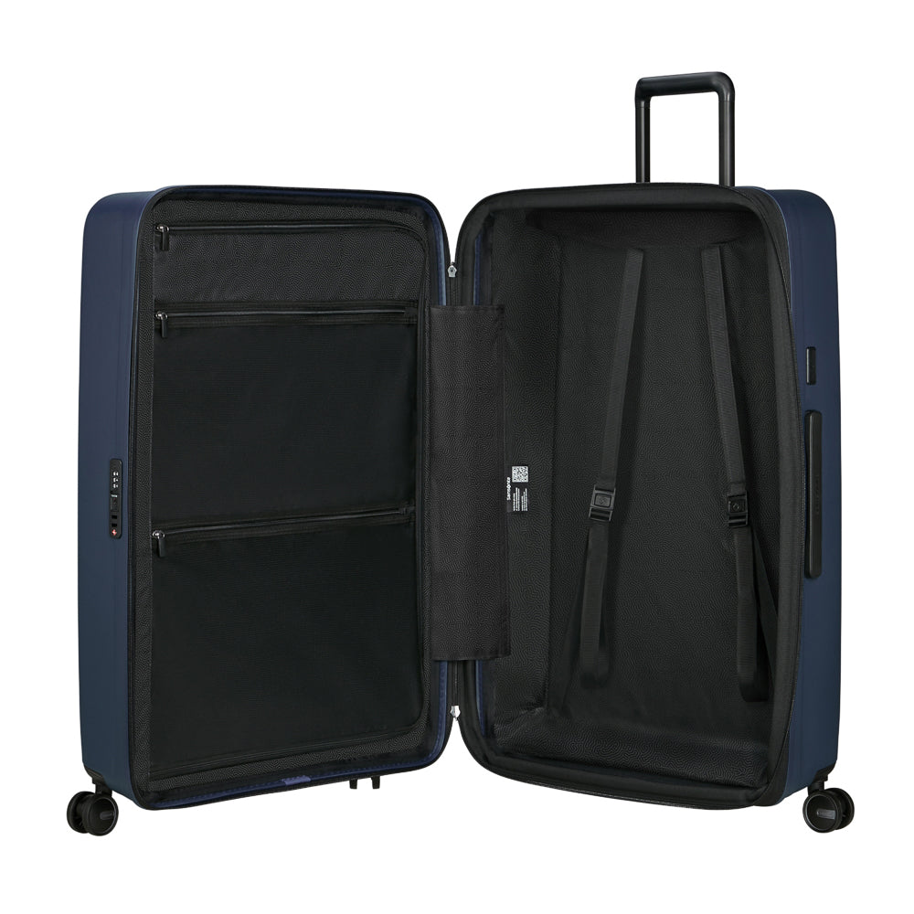 81cm Restackd Spinner Suitcase by Samsonite in midnight blue, showcasing wheels and expandable design for travel convenience.