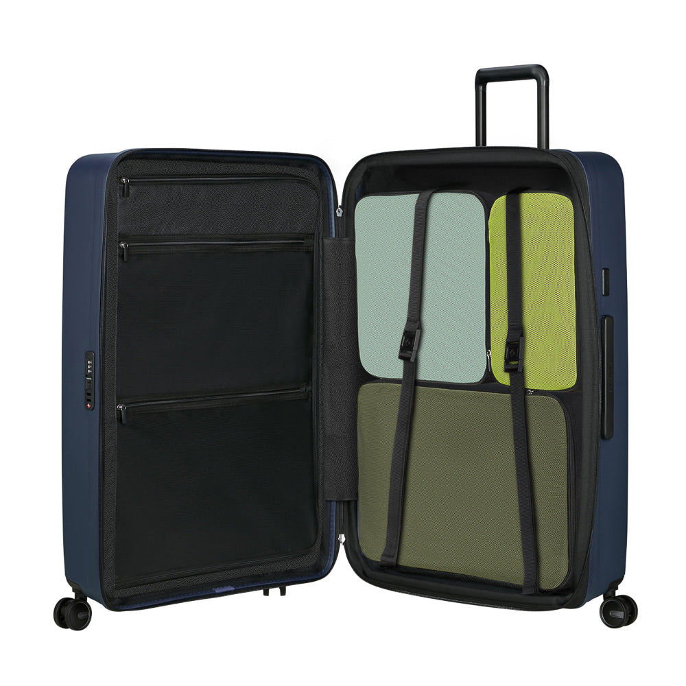 81cm Restackd Spinner Suitcase by Samsonite in midnight blue, showcasing wheels and expandable design for travel convenience.