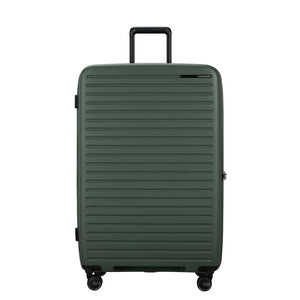 81cm Restackd Spinner Suitcase in sage green, featuring smooth wheels and a durable exterior for easy travel.
