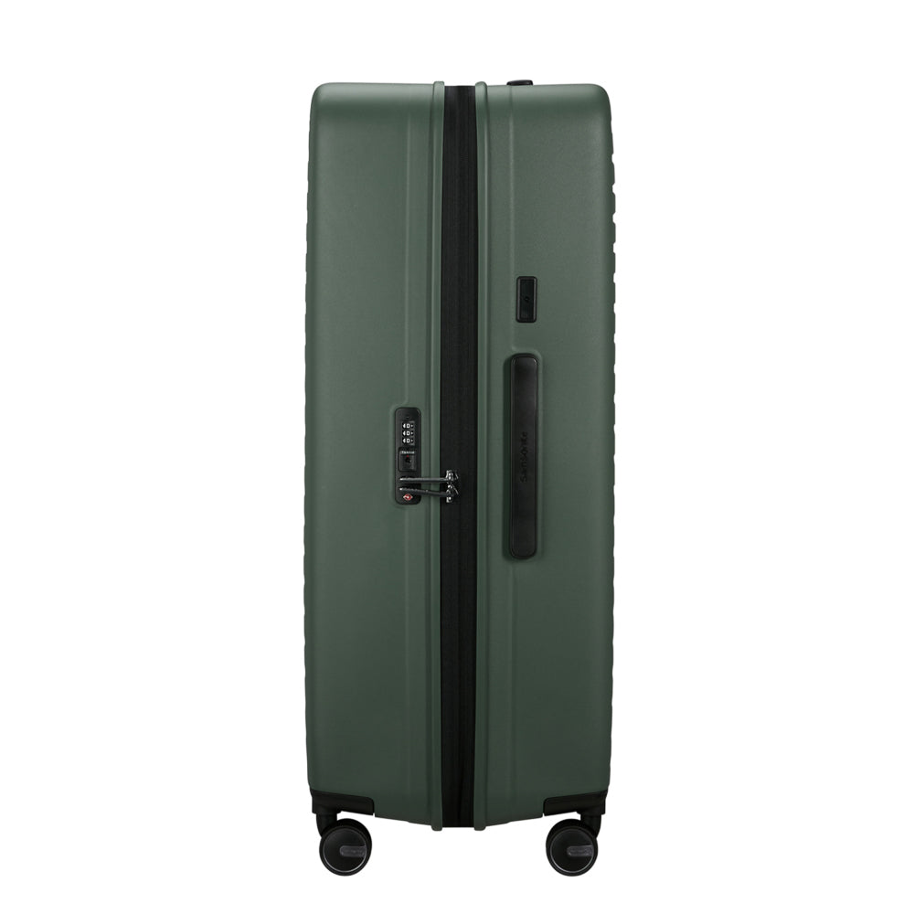 81cm Restackd Spinner Suitcase in sage green, featuring smooth wheels and a durable exterior for easy travel.