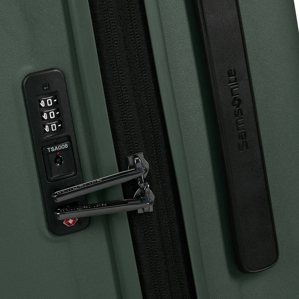 81cm Restackd Spinner Suitcase in sage green, featuring smooth wheels and a durable exterior for easy travel.