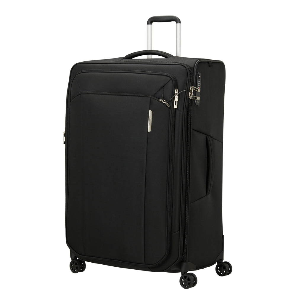 Black 82cm spinner suitcase by Samsonite, featuring four wheels and a durable design for check-in luggage.